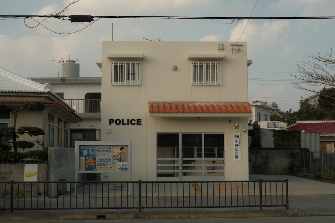 Small police station building with signage.