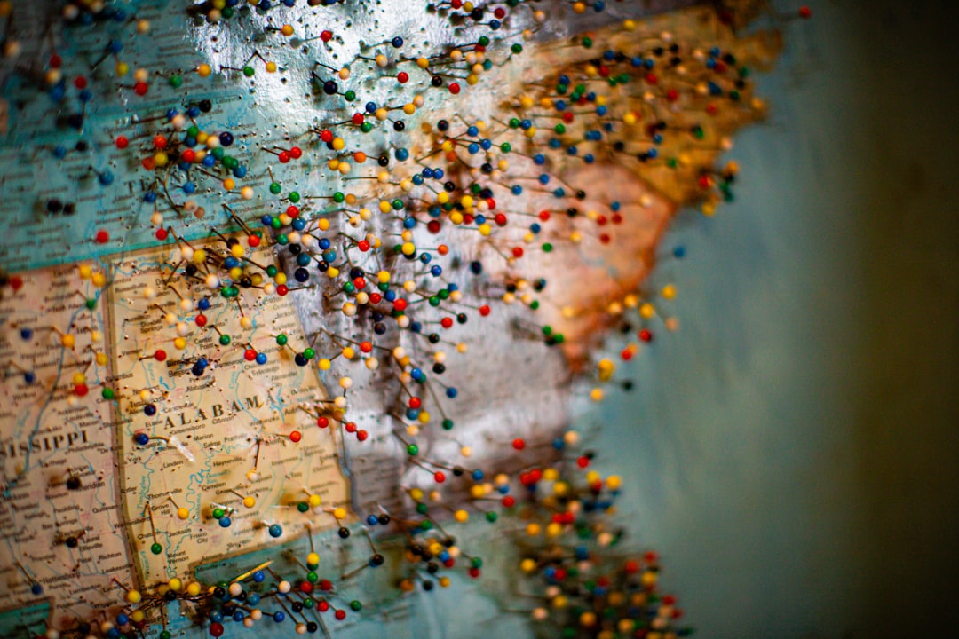 Map of the united states covered in colorful pins.